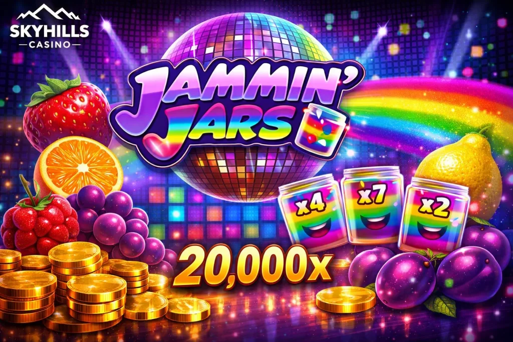 Colorful Jammin’ Jars slot game banner for Skyhills Casino featuring vibrant fruit symbols like strawberries, oranges, grapes, and lemons, with rainbow multiplier jars, stacks of gold coins, and a sparkling disco-themed background.